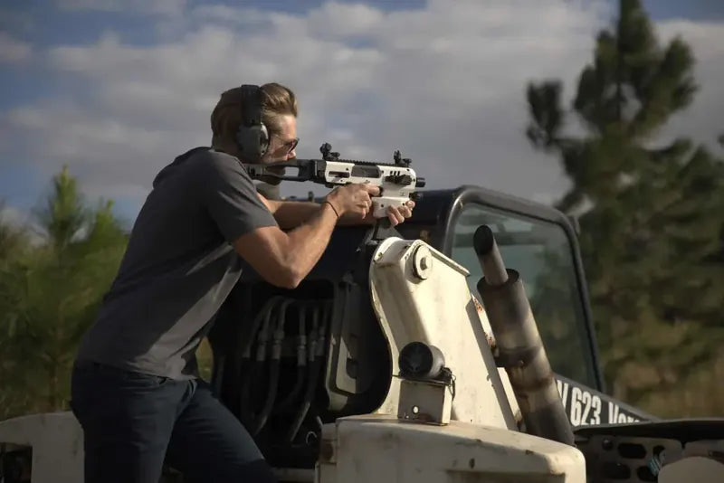 Shooter firing a CAA MCK from a rest