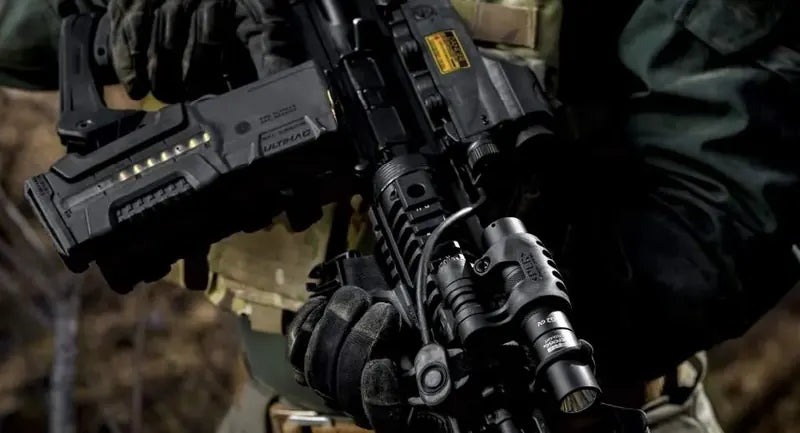 AR rifle with FAB Defense handguard and light