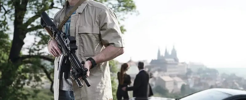 Rifle with a FAB Defense flashlight adaptor