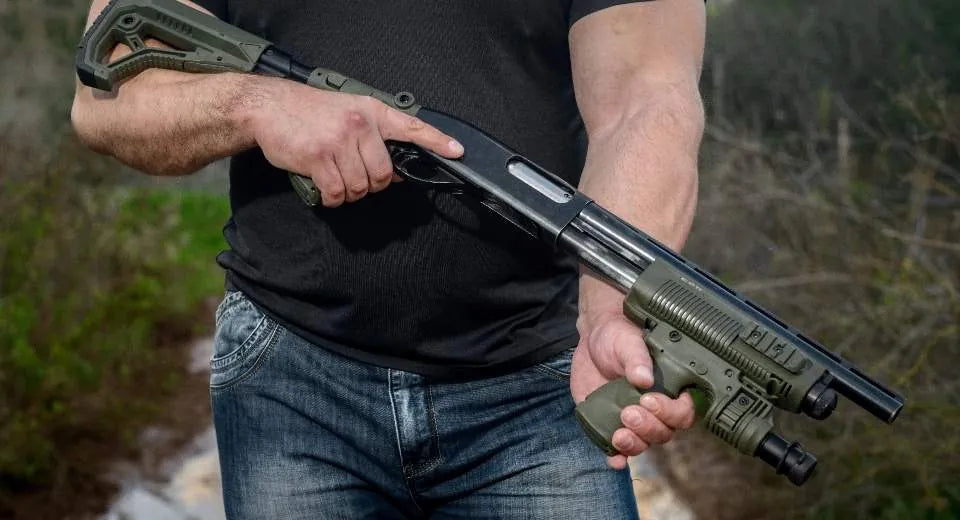 Pump shotgun with FAB Defense stock and grip