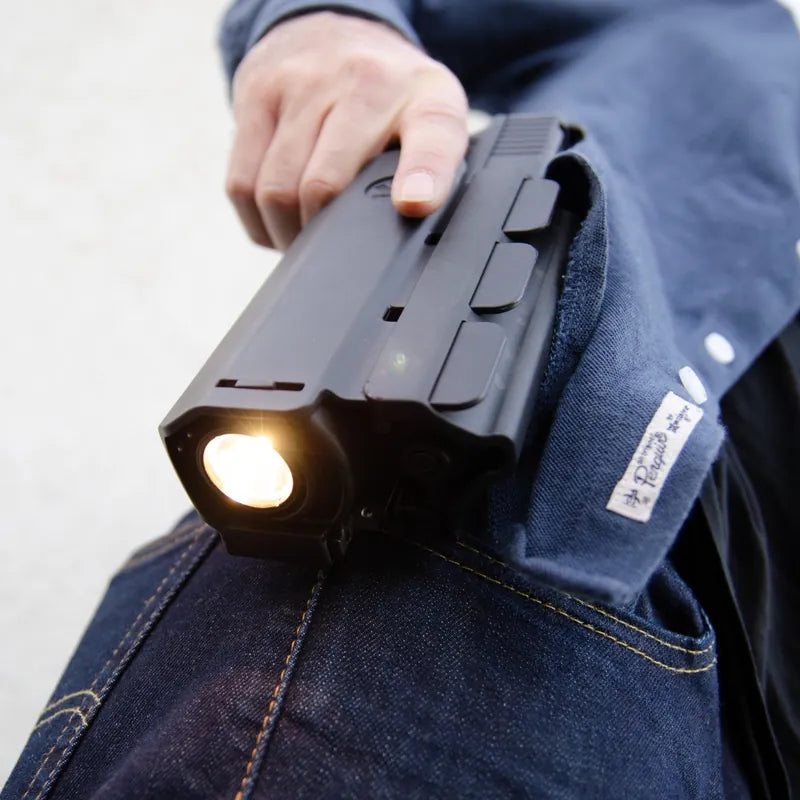 Glock with a weapon light in an ORPAZ light-bearing holster